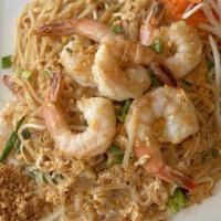 Pad Thai · Stir-fried rice stick noodles in sauce and topped ground peanut with your favorite meat, egg...