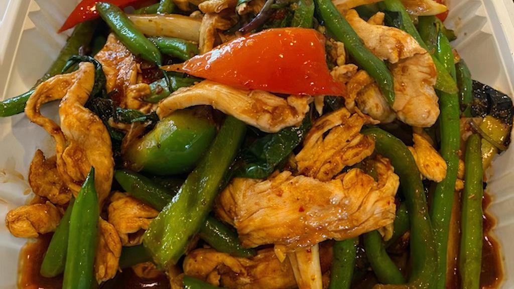 Phad Prik Khing · Sautéed garlic and red curry sauce with your choice of meat, green beans and bell peppers.