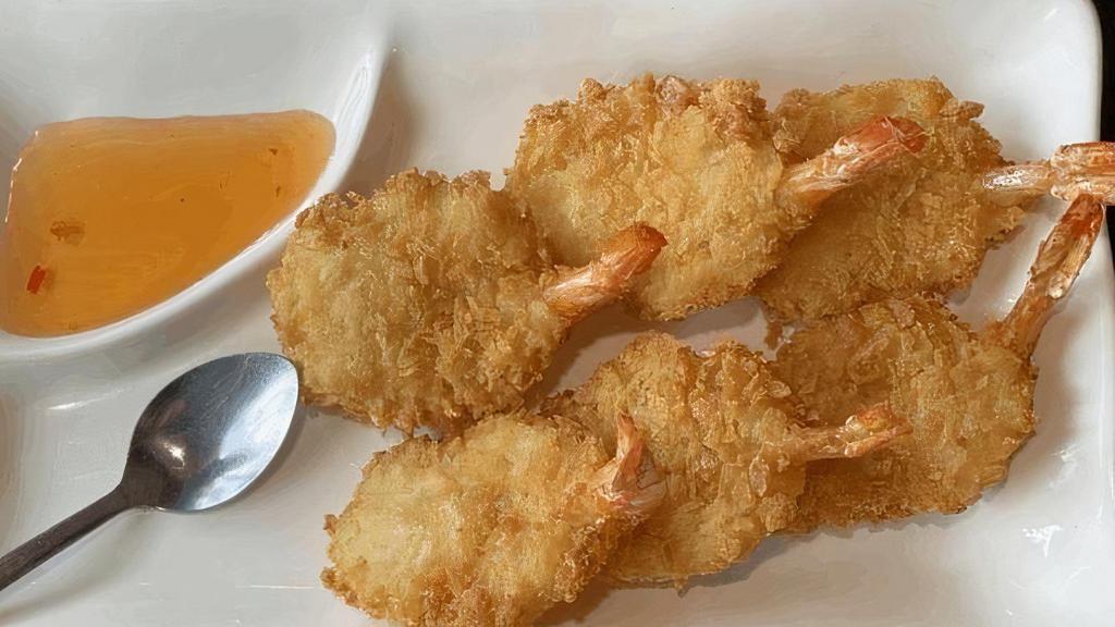 Coconut Prawns · Whole prawn tossing with coconut flake and deep fried to golden tender. Served with palm sauce.