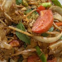 Phad Kee Mao · Stir-fried wide rice noodles in chili paste with your choice of meat, egg, broccoli, tomato,...