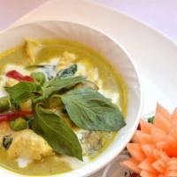 Yellow Curry · Yellow curry sauce cooked in creamy coconut milk for sharp taste with your choice of meat, p...