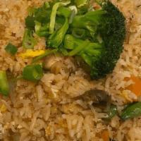 Fried Rice · Stir-fried jasmine rice and egg with your choice of meat,
broccoli, onion, carrot and tomato.