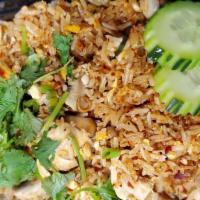 Tom Yum Fried Rice · Stir-fried Tom Yum sauce fried rice with your choice
of meat, lemon grass, button mushrooms,...