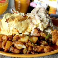 Fried Chicken Benedict · Flavorful fried chicken, scrambled eggs, applewood smoked bacon on a homemade super biscuit,...