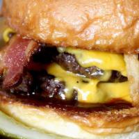 Western Barbecue Burger · Applewood smoked bacon, cheddar cheese, onion strings, and barbecue sauce.
