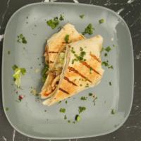 Chicken Shawarma Burrito - Build Your Own · Chicken breast marinate choice of toppings and sauce, wrapped up in a flour tortilla.