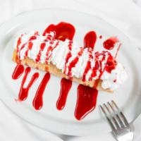 Chimi Cheesecake  · fried chimichanga filled w/ cheesecake and covered in sugar & cinnamon topped w/ whipped cre...