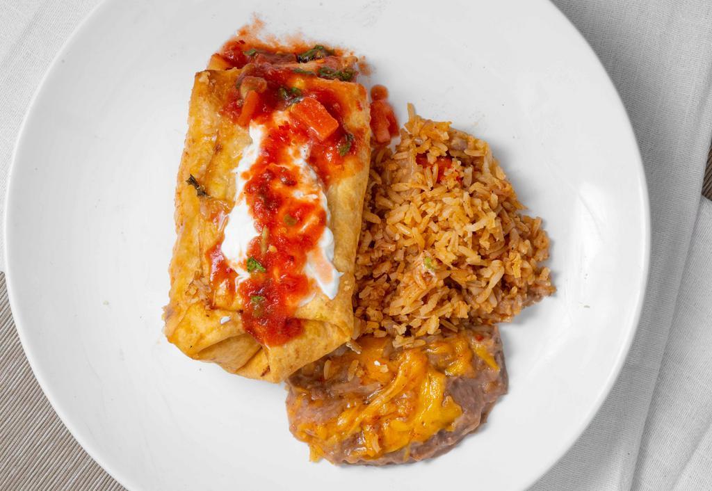 Chimichanga · With your choice taco, tamal or chile relleno, enchilada or tamal.