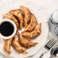 Pot Stickers (8 Pc) · Fried dumplings stuffed with chicken and vegetables.