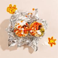 Shredded Chicken Wham! Burrito · House burrito with shredded chicken, Mexican rice, black beans, pico de gallo and lettuce.