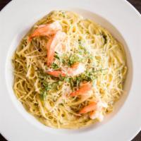 Shrimp Scampi · Shrimp, garlic butter, lemon, white wine, over thin spaghetti.