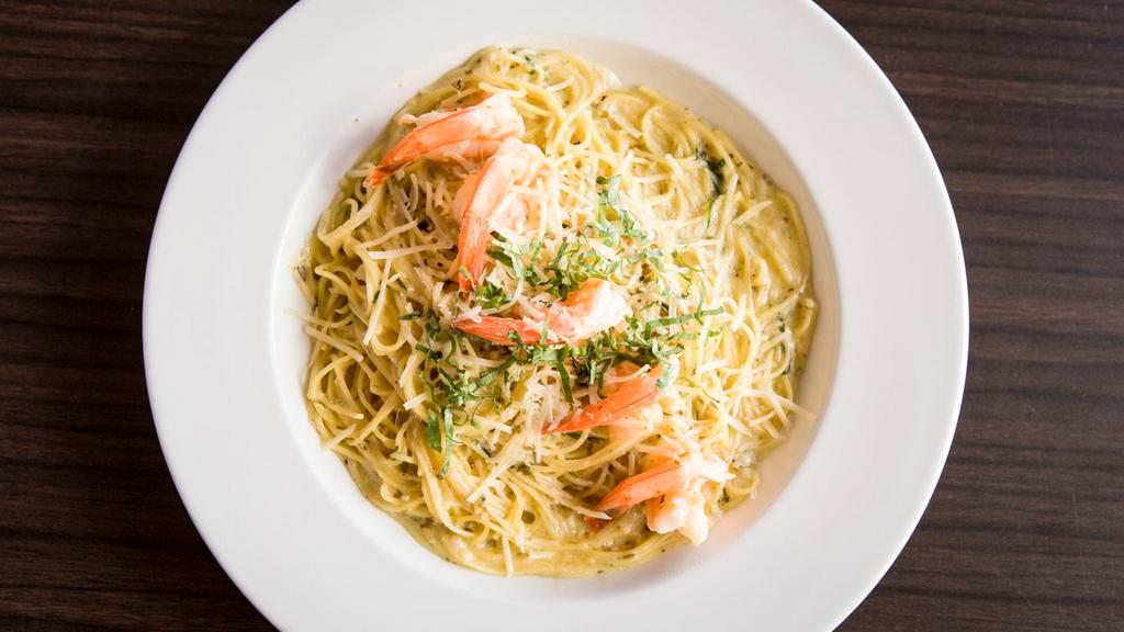 Shrimp Scampi · Shrimp, garlic butter, lemon, white wine, over thin spaghetti.