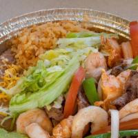 Fajita Mix  · Shrimp, steak and chicken. with two tortillas, rice and beans.