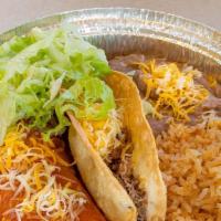 Shredder Beef Taco And Enchilada  · Served with rice and beans.