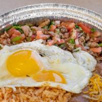 Steak Ranchero · With two tortillas, rice and beans