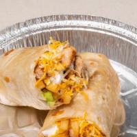 Chicken Fries Burrito · with chicken ,fries ,guacamole ,sour cream and cheese