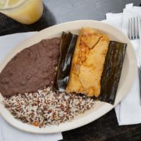 #1 | One Tamale · with a side of rice and beans.