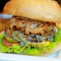 Blazing Onion Burger (D) · Piled high with caramelized onions, Tillamook white cheddar, lettuce, tomato, pickle, signat...
