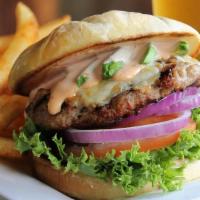 Turkey Burger (D) · House made fresh turkey patty, Monterey jack cheese, avocado, lettuce, onion, tomato, signat...