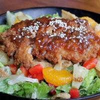 Sesame Salad (D) · Marinated chicken breast or crispy chicken strips, fresh romaine, cabbage, diced red pepper,...