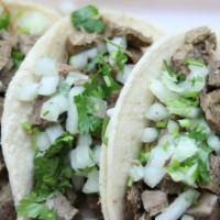 Lengua / Tongue Taco · Served with onion and cilantro. 
Price is per taco.