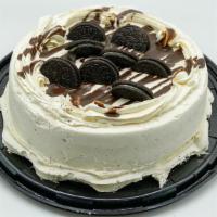 Oreo Cake · CHOCOLATE CAKE FILLED WITH BAVARIAN CREAM. COVERED WITH CREAM CHEESE FROSTING AND DECORATED ...