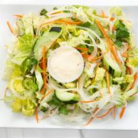 Goi Xa Lach (Side Salad) · Fresh salad, carrot, cucumber,  onion. Served with homemade dressing sauce.