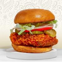 Nashville Spicy Fried Chicken Sandwich · Our signature crispy fried chicken tossed in buffalo sauce topped with crispy lettuce, tomat...
