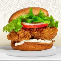 Classic Crispy Fish Sandwich · Our golden fried fish topped with our house made special sauce on a warm griddled bun.