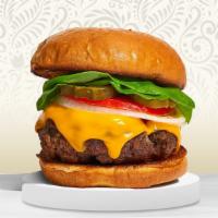 Cheese For Me Burger · American beef patty topped with melted cheese, buttered lettuce, tomato, onion, and pickles.