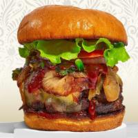 Wild Night South Burger · American beef patty topped with aged white cheddar, barbecue sauce, caramelized onions, and ...