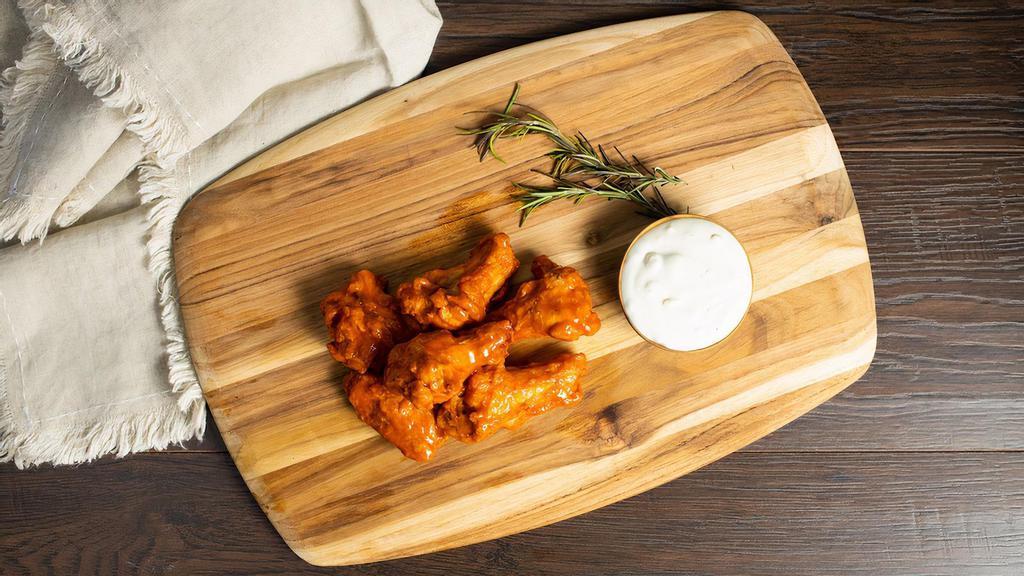 Wings For Winners · Chicken wings fried until perfectly golden served with celery & carrots, your choice of sauce and your choice of dip.