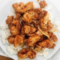 Sesame Chicken · Coated chicken stir fried with a honey sauce and onions.