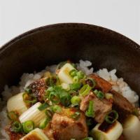 Pork Rice Bowl (Chashu Donburi)
 · Chashu (marinated pork), green onions, and rice.