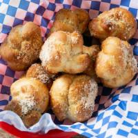 Vegan Garlic Knots · Comes with a side of rudy’s red sauce.