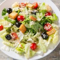 Caesar Salad · Small. Freshly cut romaine lettuce topped with Roma tomatoes, croutons, whole black olives, ...