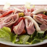 Antipasto Salad · Our salad mix with a combination of pepperoni, salami, ham, mozzarella, roma tomatoes, itali...