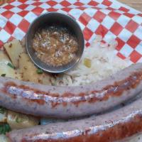 Bratwurst Plate · Two grilled Zenners brats served with Sauerkraut and German potato salad.