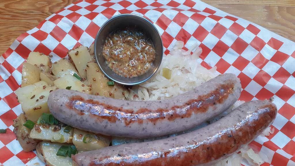 Bratwurst Plate · Two grilled Zenners brats served with Sauerkraut and German potato salad.