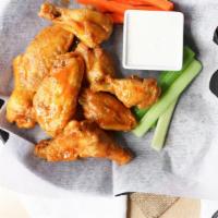 Buffalo Wings · Ten plump wings served with carrots, celery & ranch