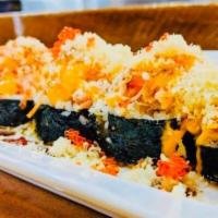 Volcano · Three kinds of fish, top: snow crab, crunchy, tobiko, eel sauce, spicy mayo, baked sauce, cr...