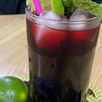 Bissap · Traditional West African juice made with hibiscus, lime, mint leaves, and sugar.
