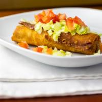 Chimichangas · A mix of shredded beef and potatoes. Rolled up in chimichanga form then dipped in our corn o...