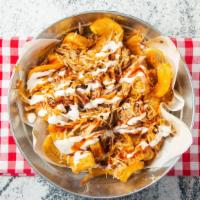 Hog Heaven Fries · Sidewinder fries covered with melted cheese, pulled pork, bbq sauce and Ranch dressing