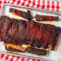 Ribs · St. Louis-style pork spare ribs coated in our original rub and smoked to “melt-in-your-mouth...