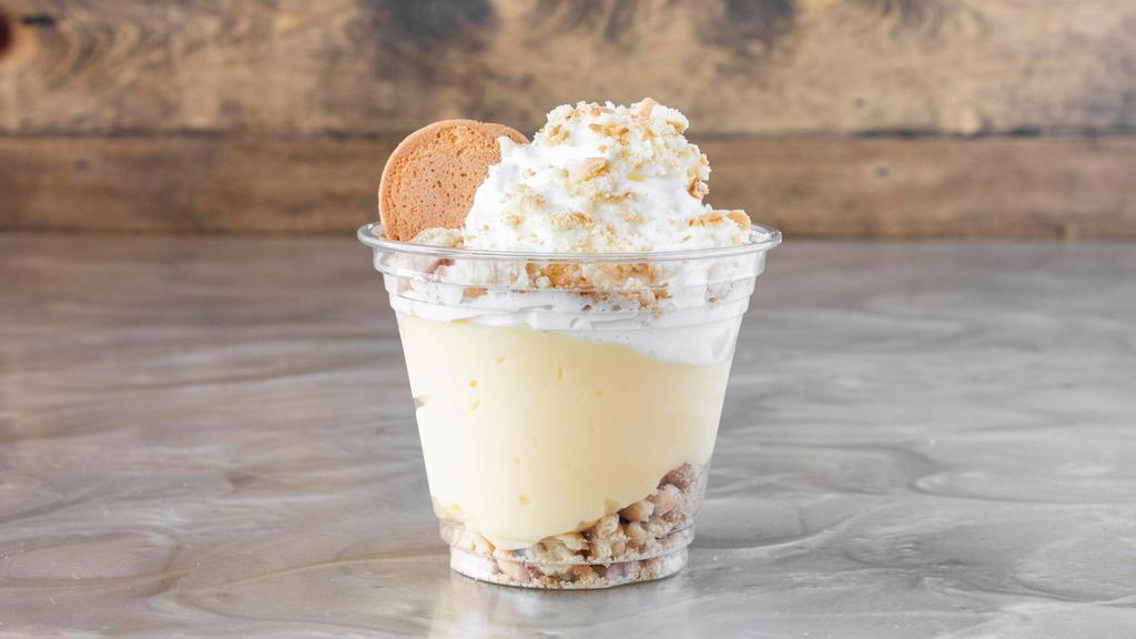Banana Pudding · Another Southern classic, we make our pudding from scratch with vanilla wafers, fresh sliced bananas, and plenty of whipped cream