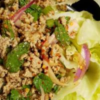 Larb · Ground chicken or pork mixed with mint, red onion, green onion, cilantro, chili, ground rice...