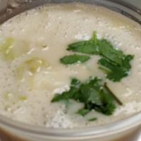 Tom Kha · Thai coconut soup with coconut milk, galangal, lemongrass, kaffir lime leaves, lime juice, f...