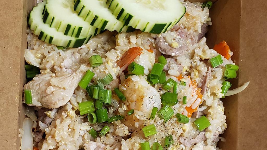 Chaiyo Fried Rice · Stir-fried jasmine rice with mix protein, chicken, beef, pork, shrimp, eggs, onion, carrot, tomato, and house soy sauce.