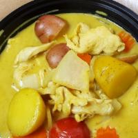 Yellow Curry · Yellow curry paste, carrot, potato, tomato, onion, and coconut milk.